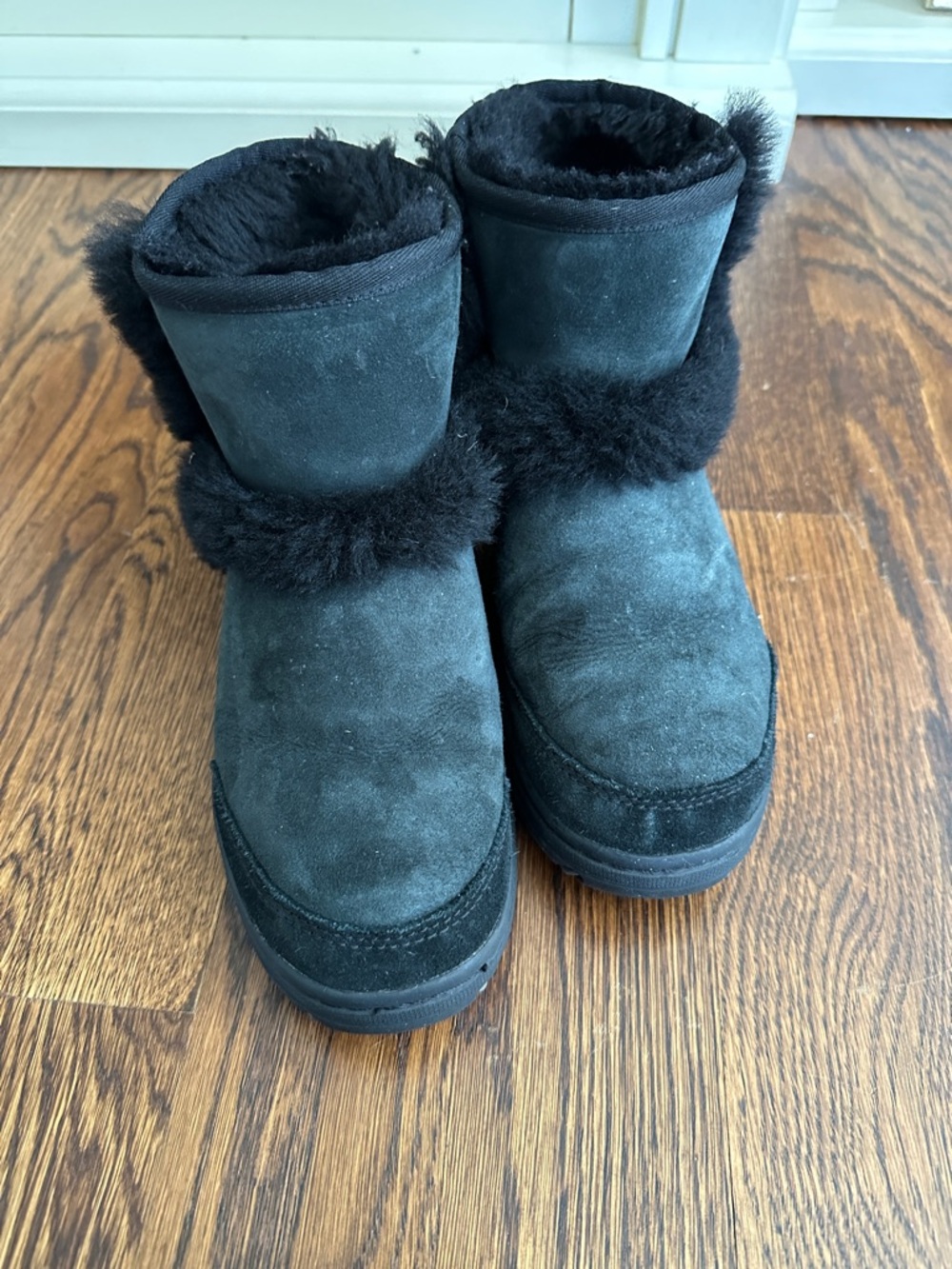UGG Black Short Shearling Boot with Pom Detail - Picture 2 of 10